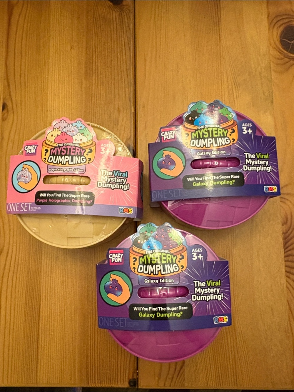 3 Mystery Dumpling 2 Galaxy Edition and one purple holographic